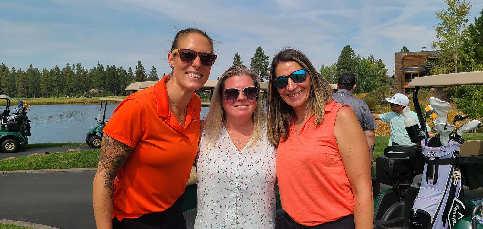 three lady golfers